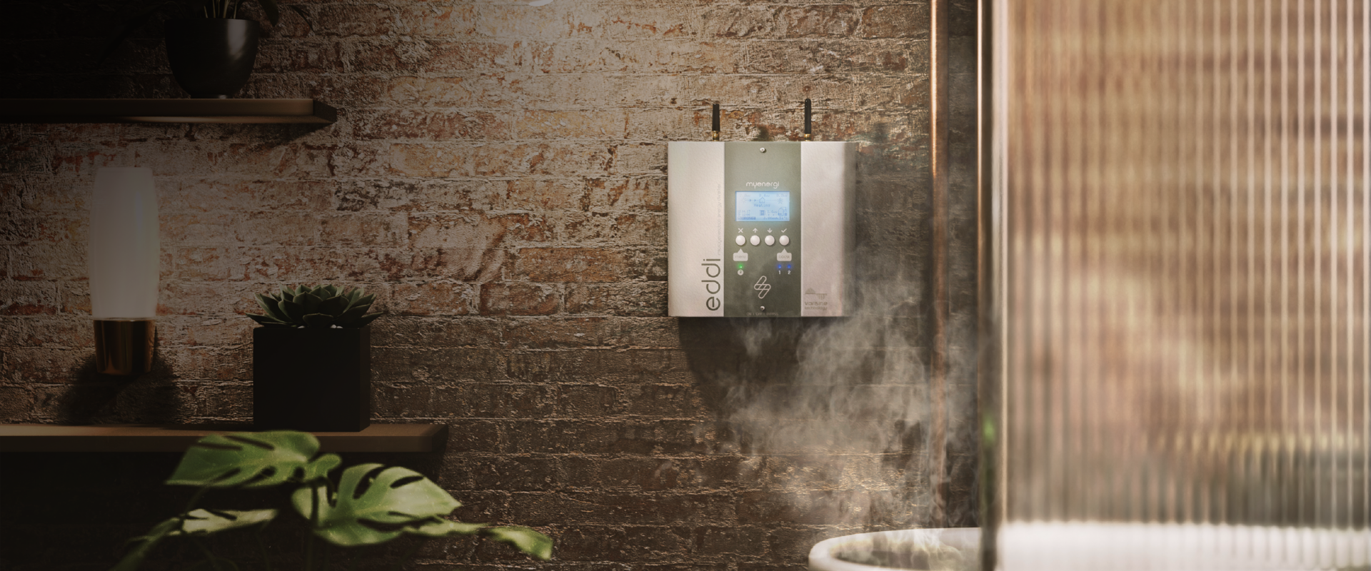 Image of a bath with the eddi hot water diverter behind it | myenergi Ireland