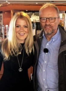 A photograph of Jordan Brompton with Robert Llewellyn - Our Founders Story, becoming a renewable energy tech firm